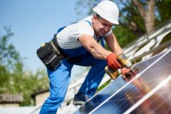Stand-alone exterior solar panel system installation, renewable green energy generation concept. eigenheim umweltbonus